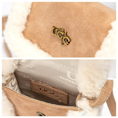 UGG crossbody phone bag gold logo clasp and lined interior detail